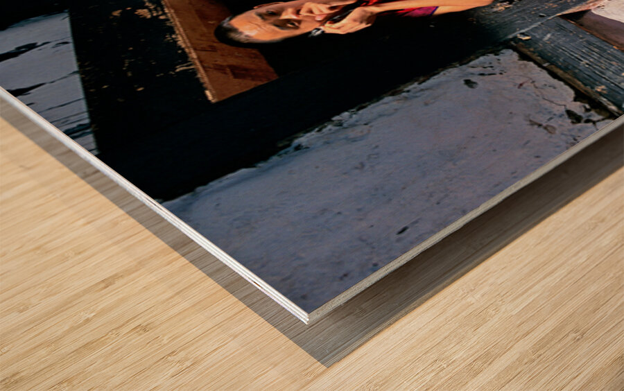 Monk in red robes on cell phone. Wood print