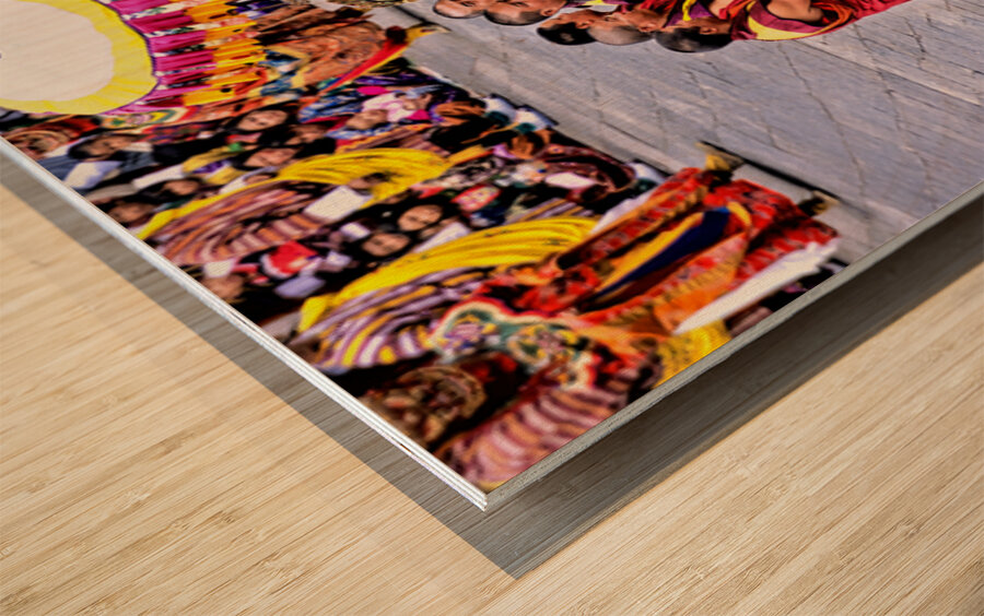 Monks in red robes gathered around a golden statue. Wood print