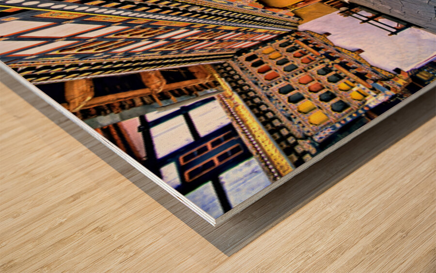 Vibrant ornate Bhutanese temple architecture and stone courtyar Wood print
