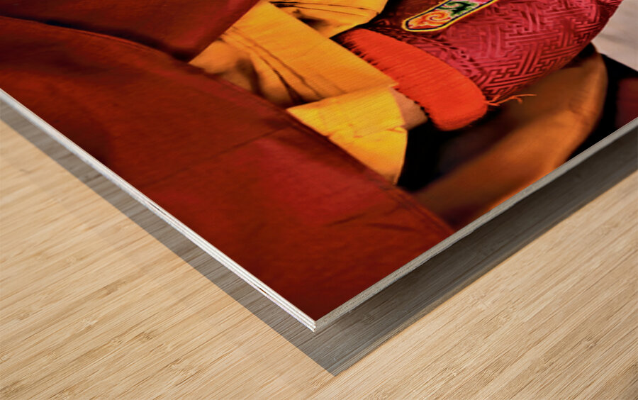 Colorful embroidered traditional boots and robes. Wood print