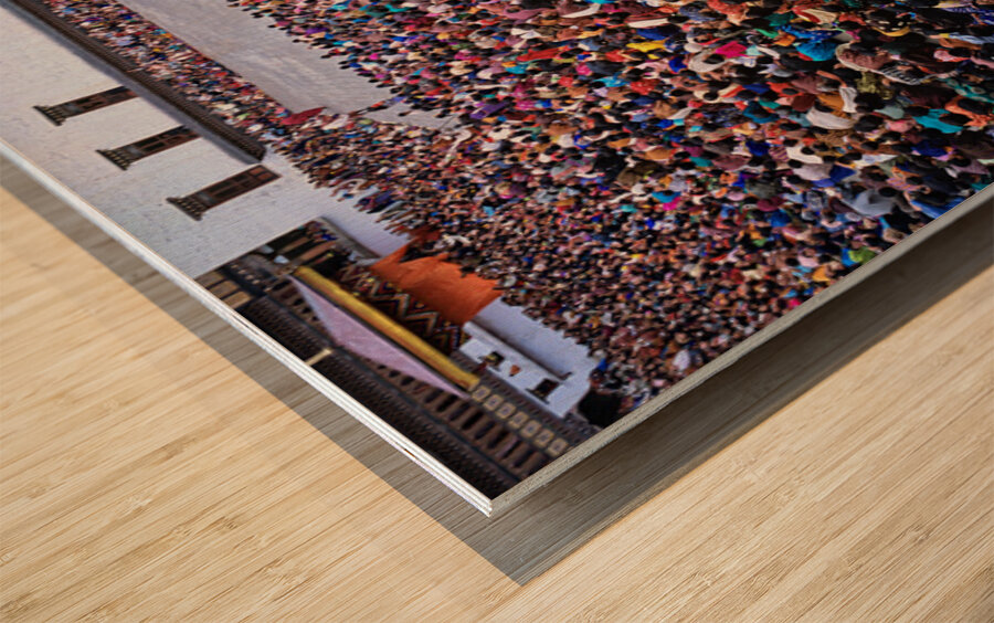 Large crowd watches traditional dance performance at outdoor fes Wood print