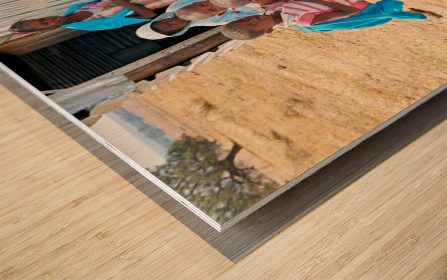 Students gather outside a school in Kavango Region Namibia Wood print