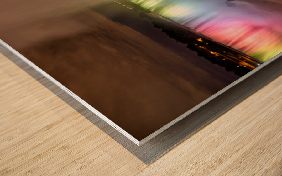 Niagara Falls illuminated at night with colorful lights. Wood print