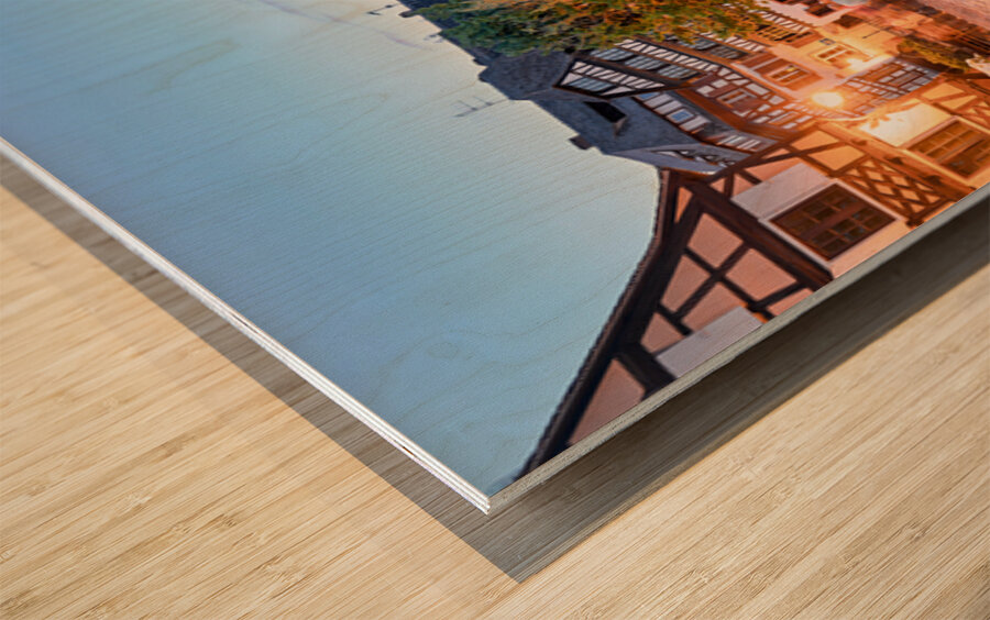 Evening in Petit France with timber framed houses by water Wood print