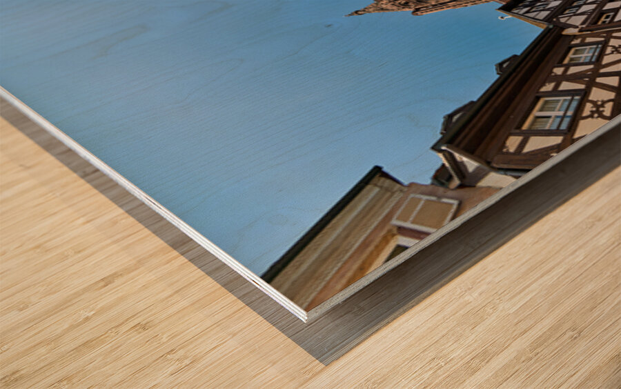 Tourists gather at Strasbourg Cathedral in Alsace on a sunny day Wood print