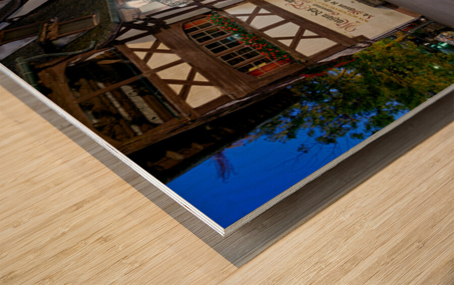 Colorful timber houses and people walking in Strasbourg at night Wood print