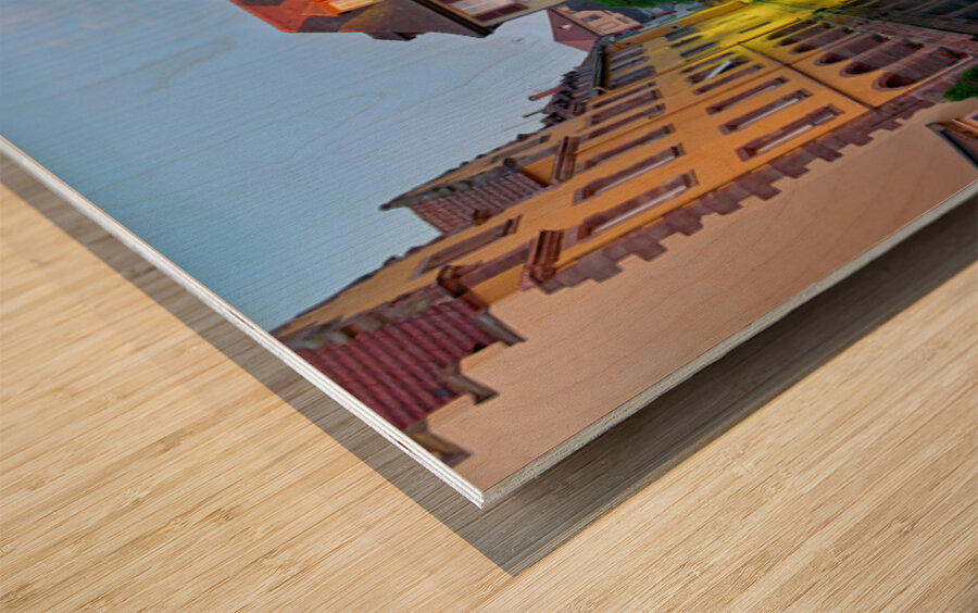 Timber framed houses and visitors in Colmar canals at dusk Wood print