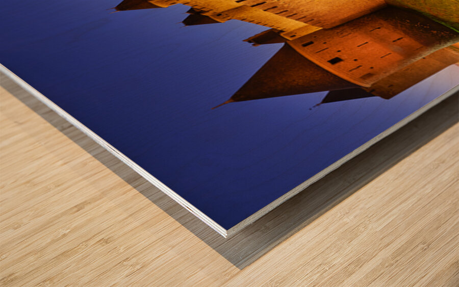 Exploring the ancient walls of Carcassonne in France at twilight Wood print