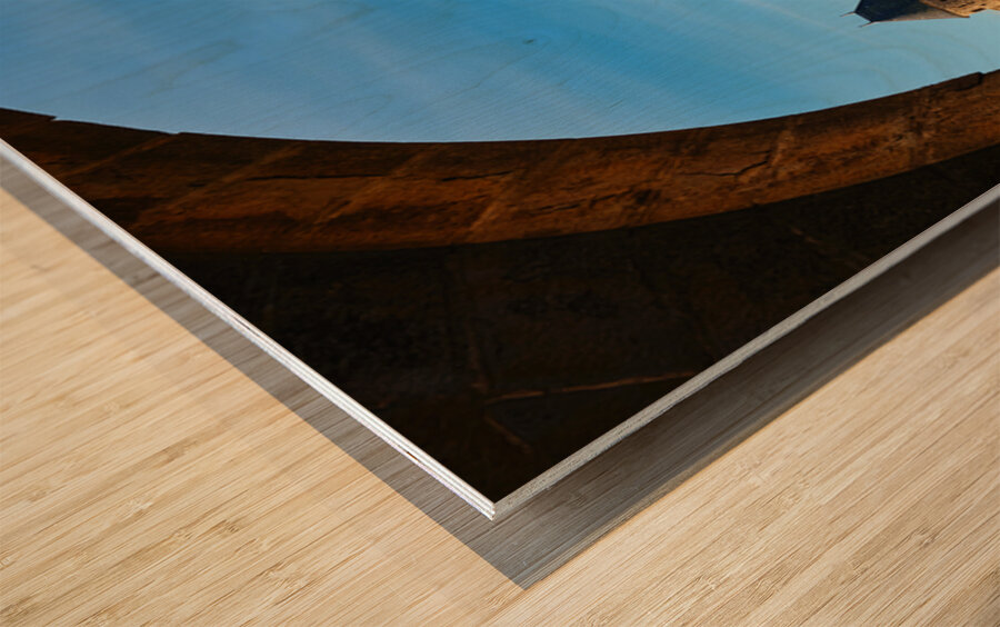 Exploring the historic walls of Carcassonne in France under blue Wood print