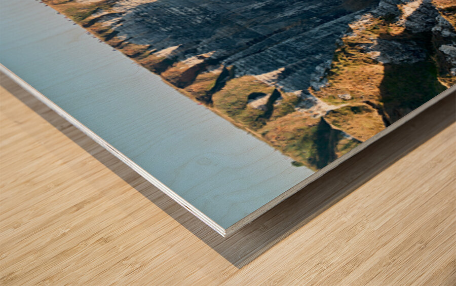 Chalk cliffs of Etretat along the coast of Normandy in France Wood print