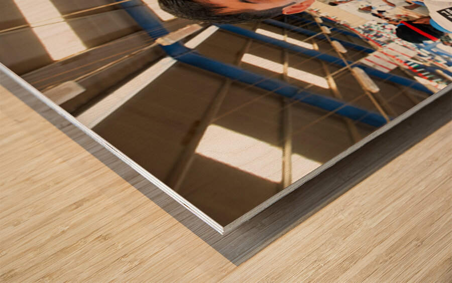 Smiling fishmongers hold fresh fish at market in Dubai UAE Wood print