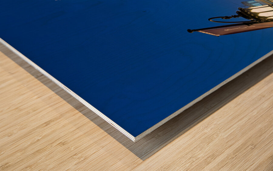 Night lights and waterfront dining in Dubai cityscape Wood print