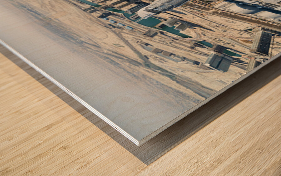 Skyline view of Dubai with skyscrapers and artificial lake Wood print