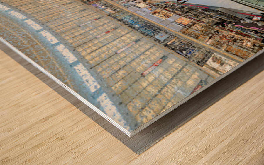 Busy shopping mall in Dubai with escalators and various stores Wood print