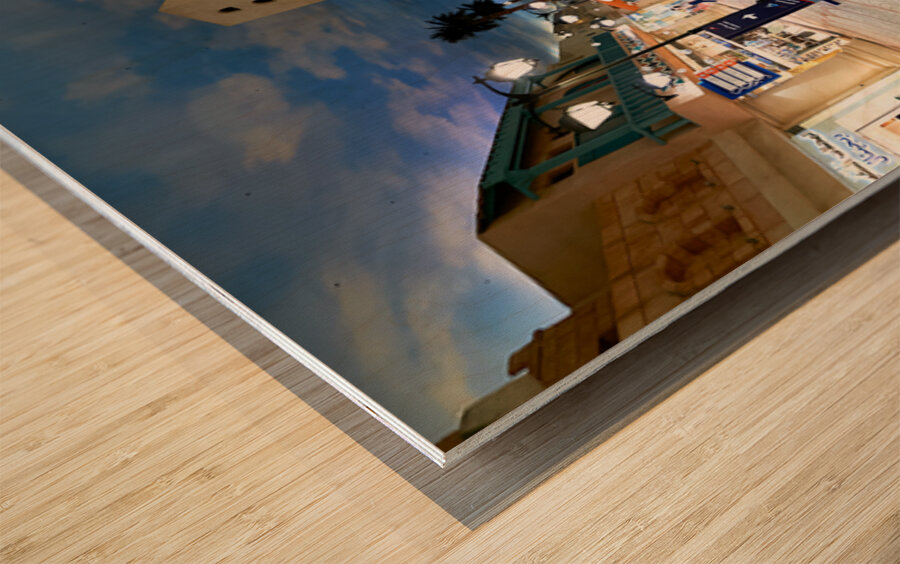 Shoppers stroll through a mall mimicking Dubais outdoor streets Wood print