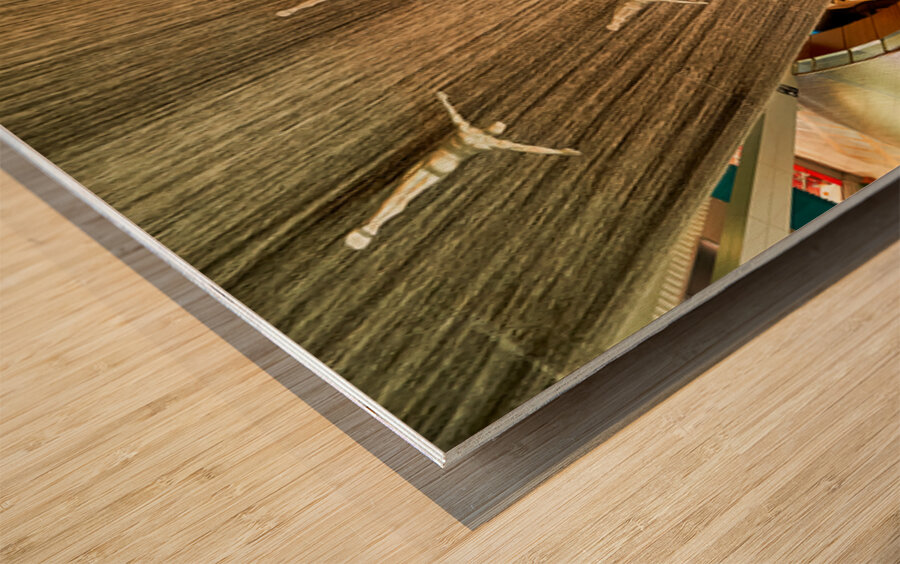 Dubai Mall waterfall features diving sculptures in UAE Wood print