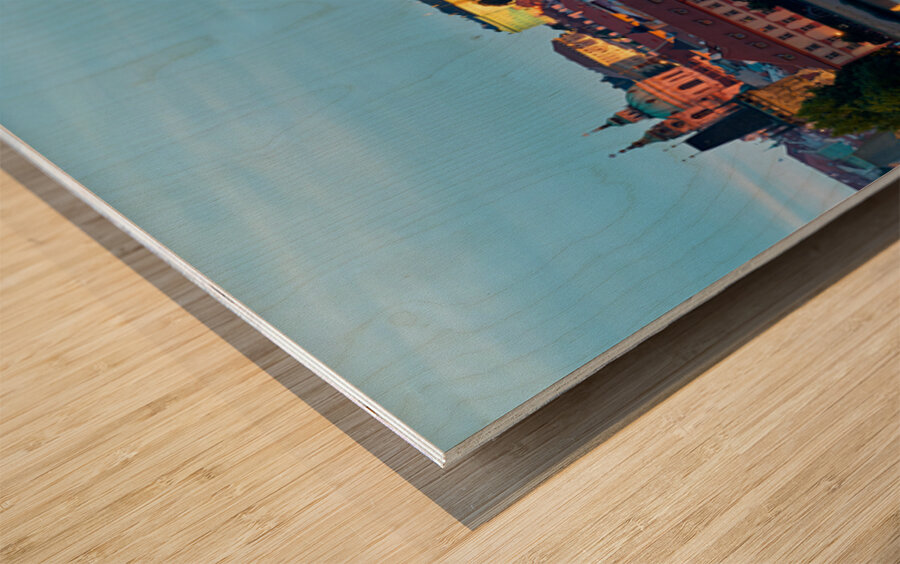 Prague cityscape at night with castle and river reflections. Wood print