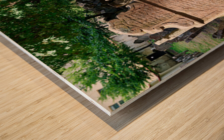 Ancient Jewish cemetery with weathered gravestones and trees. Wood print