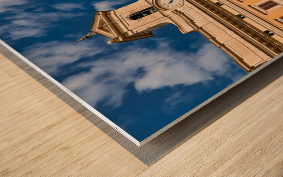 Palazzo Montecitorio stands in Rome Italy during a clear day Wood print