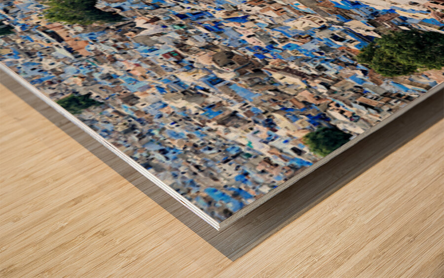 Cityscape of blue houses in Jodhpur Rajasthan during the aftern Wood print