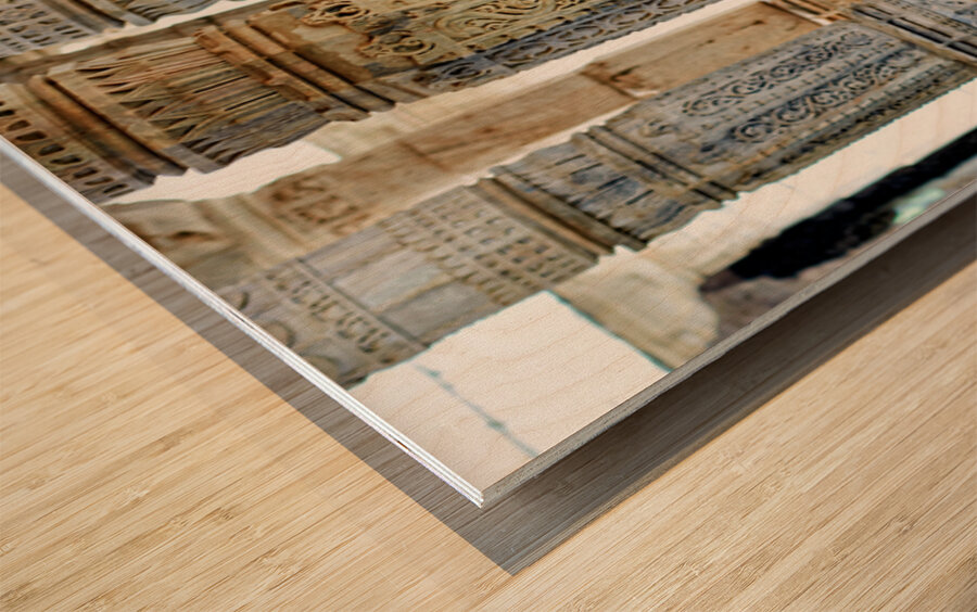 Jain old temples with intricate pillars in Ranakpur Rajasthan Wood print