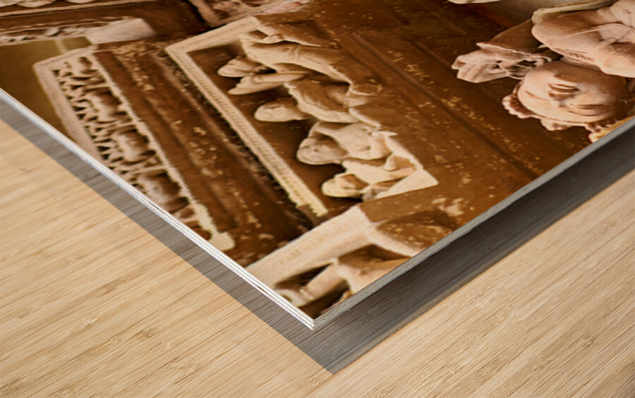 Hindu temples in Khajuraho display intricate erotic carvings Wood print