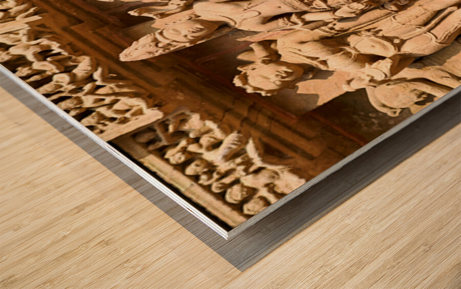Hindu temples in Khajuraho display intricate carvings of life Wood print