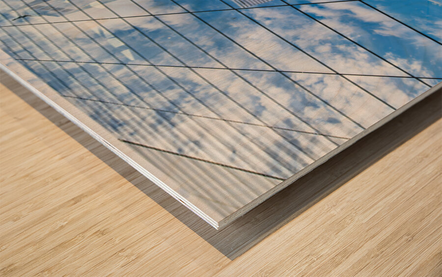 Reflections of one world trade center in manhattan Wood print