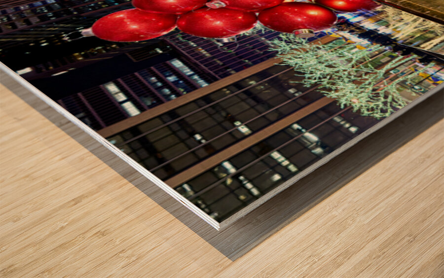 Manhattan showcases big red ornaments at Christmas time Wood print