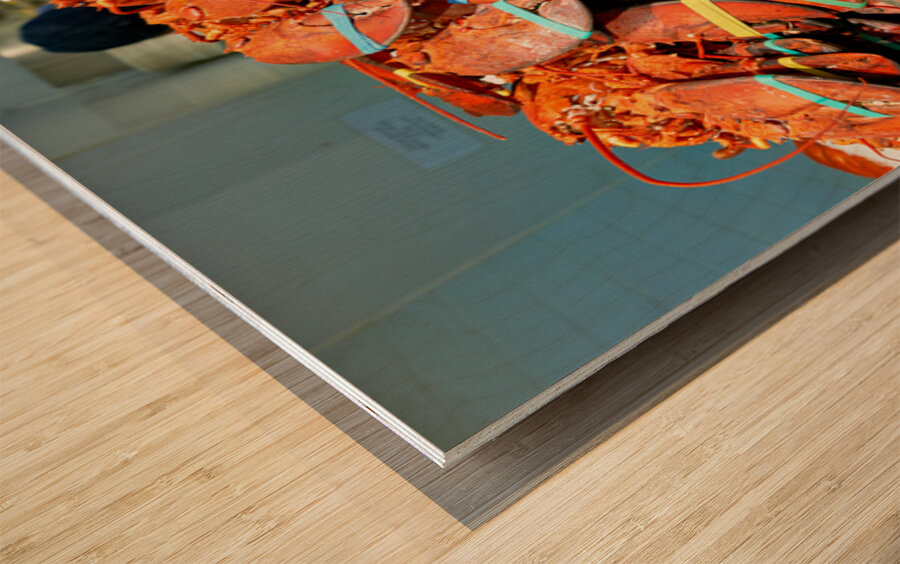 Lobsters are piled high at the Lobster Place Restaurant Wood print