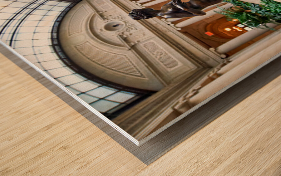 Visitors explore the courtyard at the Frick Collection in Manhat Wood print