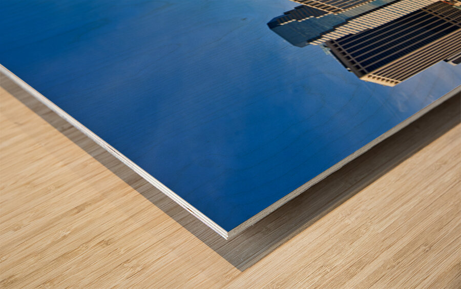 Manhattan skyline view with skyscrapers and waterfront area Wood print