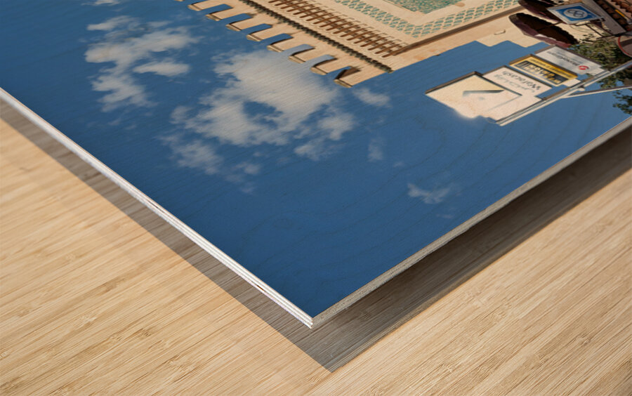 People walk through Bab Bou Jeloud a famous gate in Fez Morocc Wood print