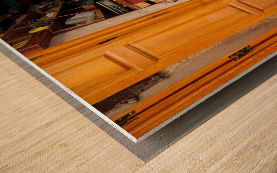 Old man in second hand shop at medina in Fez Morocco Wood print