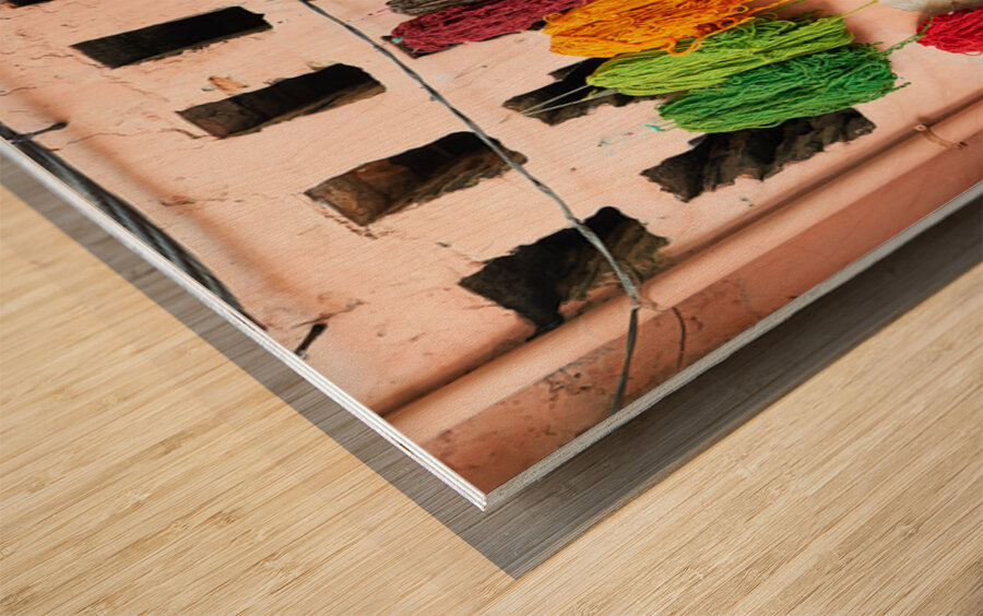 Hanging dyed threads in the dyers souk of Marrakesh Morocco Wood print