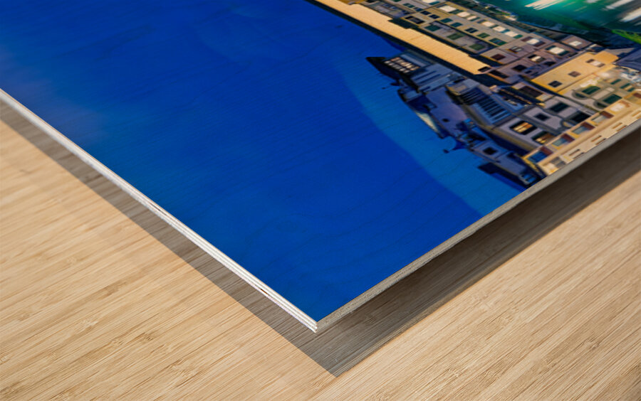 Ponte Vecchio bridge in Florence under evening sky over river Ar Wood print