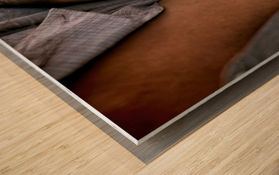 Feeding a baby in Myanmar during daytime hours Wood print