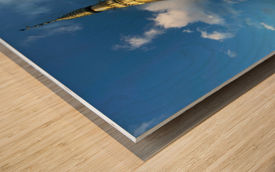 Golden stupa at Sagaing Paya in Myanmar under blue sky Wood print