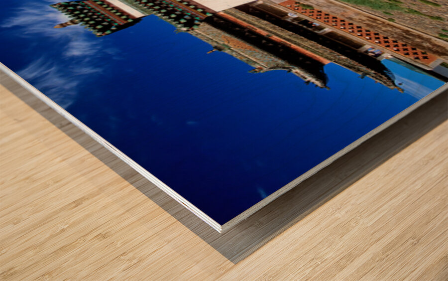 Erdene Zuu Monastery stands in Mongolia under a blue sky Wood print