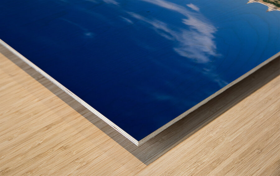 Erdene Zuu Monastery stands in Mongolia under a clear blue sky Wood print