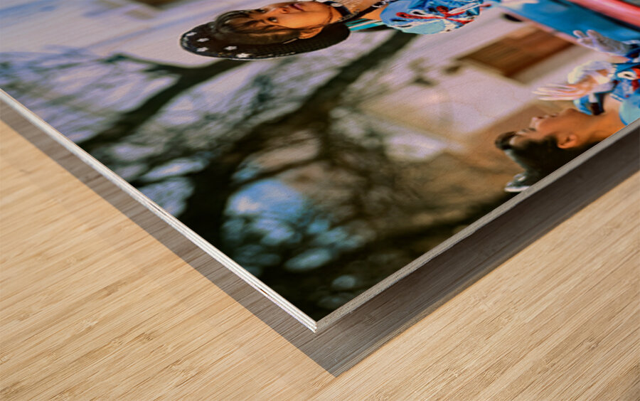 Dancers in blue costumes perform during cultural festival in Arg Wood print