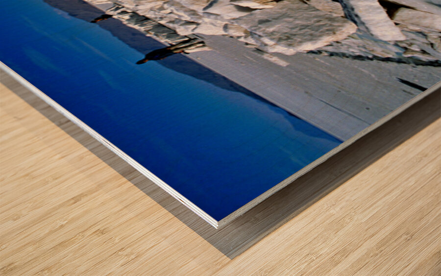 Explorers on a salt flat with salt blocks and water. Wood print