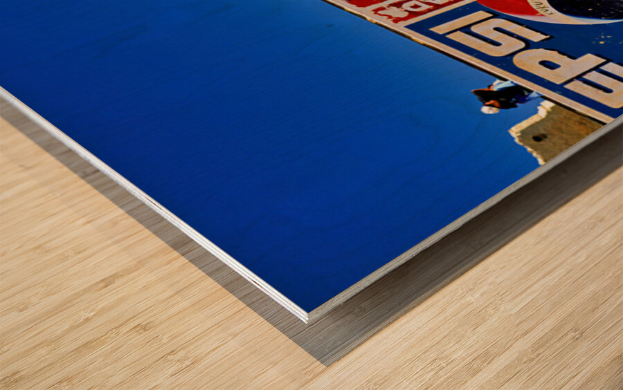 Welcome to Bolivia sign on a wall with old ads. Wood print