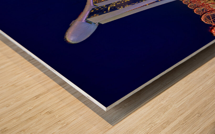 Sunset at marina bay sands artscience museum and helix bridge Wood print