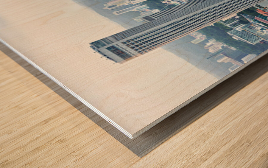 Visitors enjoy the Infinity Pool at Marina Bay Sands Wood print