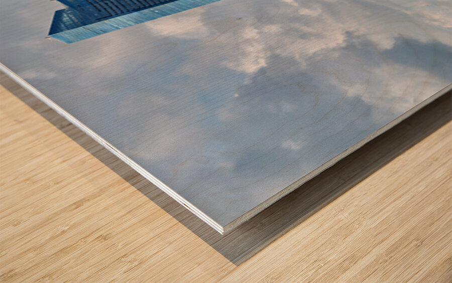 People are walking near a bridge in Singapores financial distri Wood print