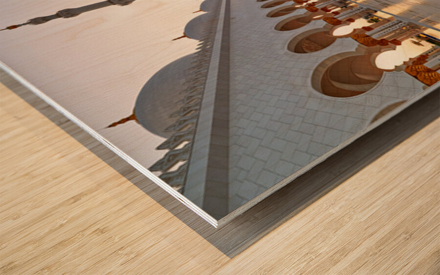Visitors explore Sheikh Zayed Grand Mosque in Abu Dhabi Wood print