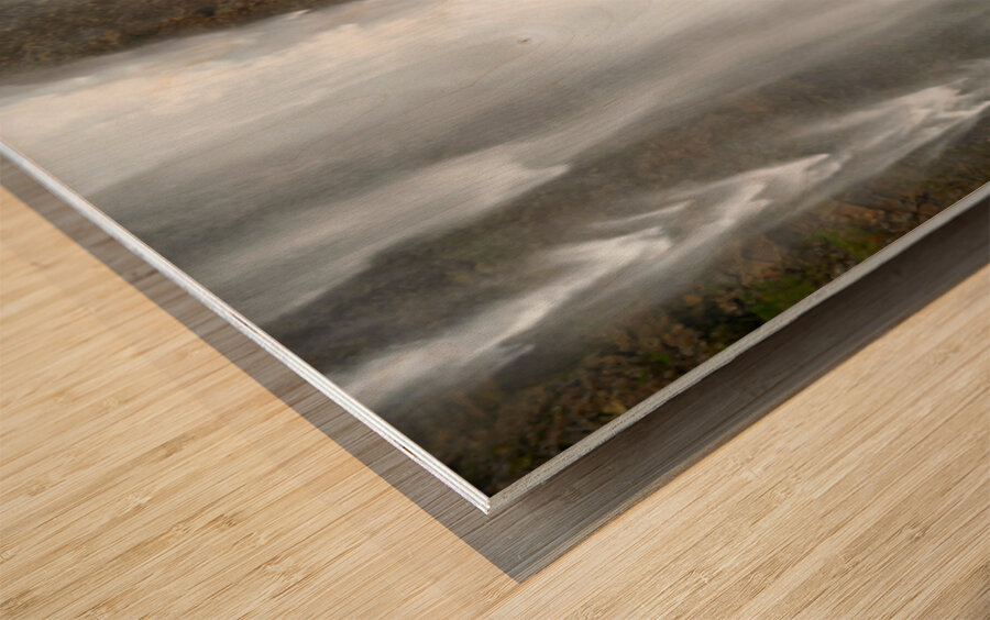 Woman walks near Seljalandsfoss waterfall in Iceland Wood print