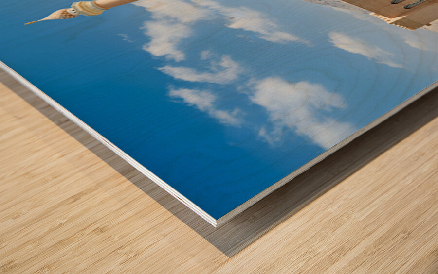 Nizwa Fort view with mountains and clouds in Oman Wood print