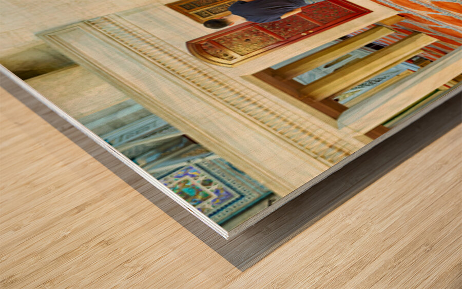 People pray inside Suleymaniye Mosque in Istanbul Turkey Wood print